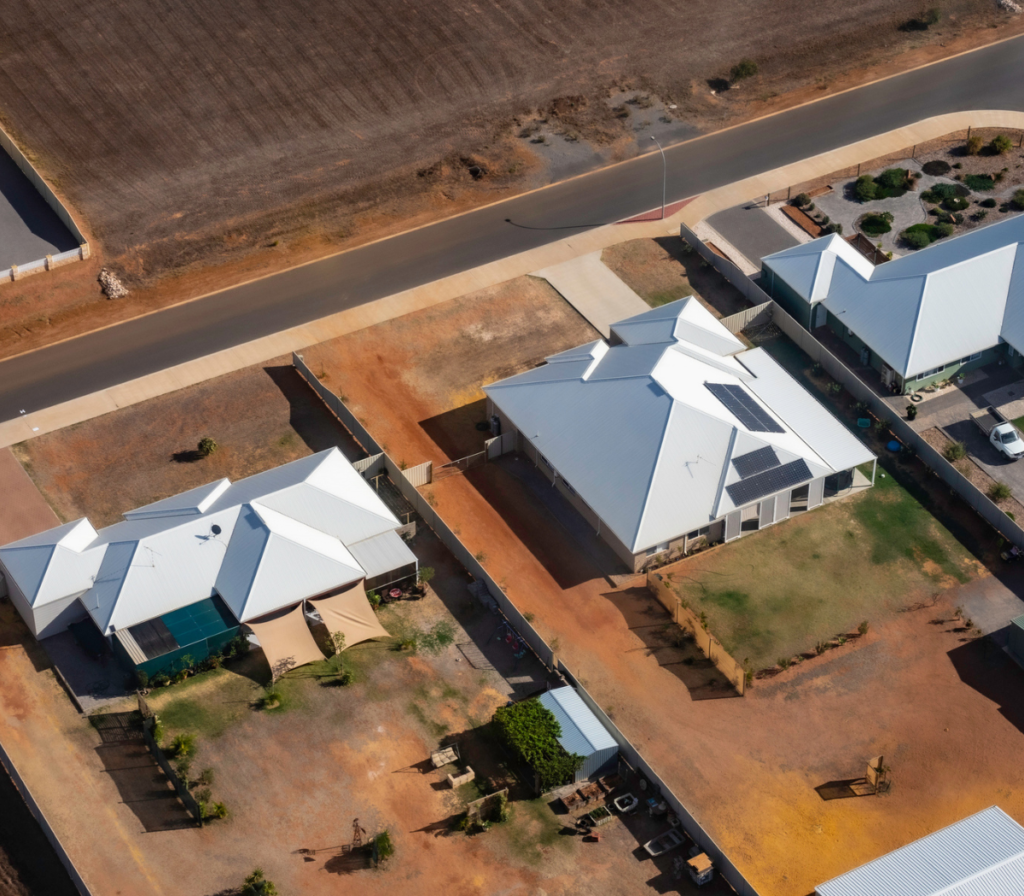 House against the red dirt of northern WA, where the rent-or-buy question is sharper than anywhere in the country