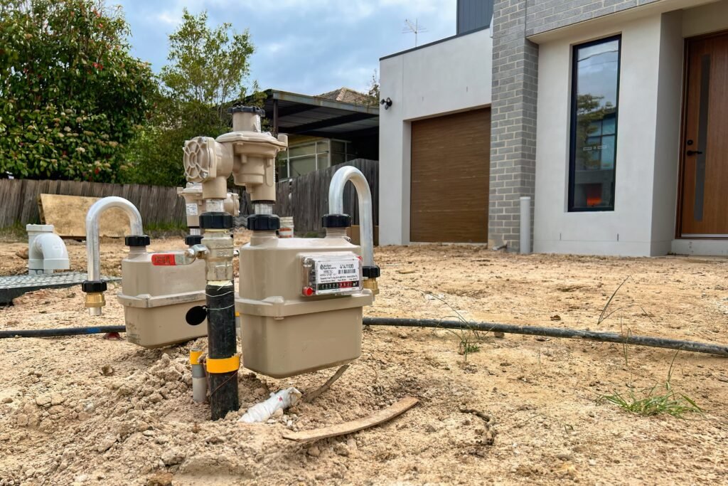 New home under construction with services being connected, the stage a construction loan funds through progress payments